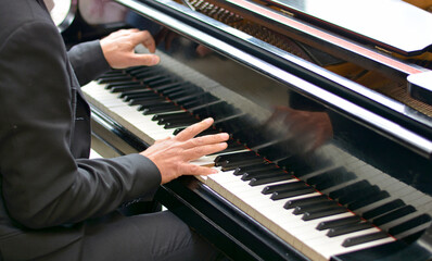 the pianist plays a sweet melody