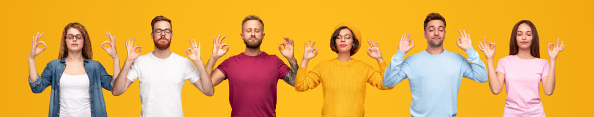 Group of young people meditating with mudra gesture