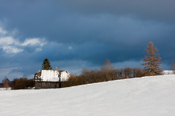 Old abandoned house in winter 