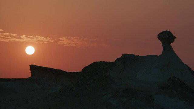 Interesting rock formations in silhouette during the golden sunrise in Zekreet Desert in Qatar 2.