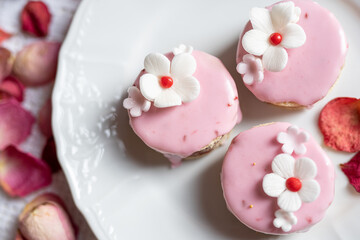 Fototapeta na wymiar pink sponge cake with flowers and petals wedding, valentine, spring, mothersday love cake 