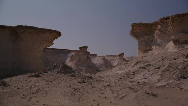 Camera sliding from left to right showing the rocky area in Zekreet Desert in Qatar 1.
