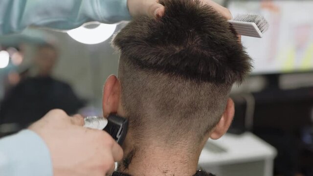 mens haircut (trim by barber slow motion)