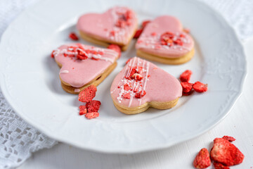pink wedding valentine love cake in a heart shape pink dessert with freeze dried strawberries