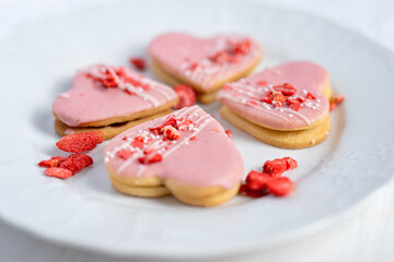 pink wedding valentine love cake in a heart shape pink dessert with freeze dried strawberries