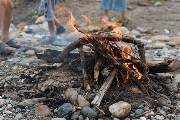 bonfire by the river in summer