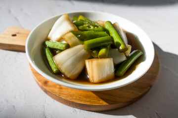 Green onion and stem of garlic pickle, Korean side dish.