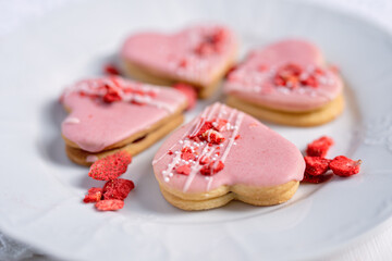 pink wedding valentine love cake in a heart shape pink dessert with freeze dried strawberries