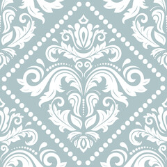 Classic seamless vector pattern. Damask orient ornament. Classic vintage light blue and white background. Orient ornament for fabric, wallpaper and packaging