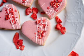 pink wedding valentine love cake in a heart shape pink dessert with freeze dried strawberries