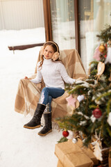 beautiful young girl in a white sweater 