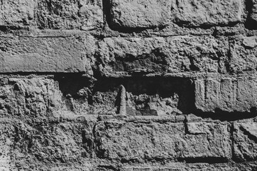 Black and white old brick wall background