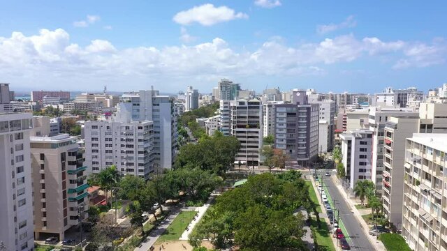 San Juan Puerto Rico Condado, Santurce,  Cinematic Drone Shot with colorful beach and cristal clear sky Parroquia Stella Maris Catholic Church