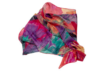 Silk neckerchief isolated. Closeup of a beautifully wrapped multicolored silk scarf or headscarf with a pattern isolated on a white background.