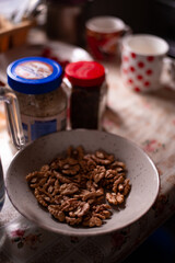 a plate with walnut kernels