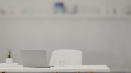 3D rendering, worktable with computer laptop, glass of water and plant pot in home office, 3D illustration