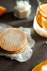 Viennese waffles on a black background. sweet table concept. Sweets for tea.