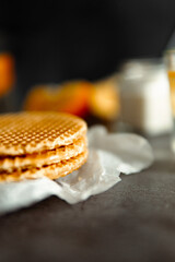 Viennese waffles on a black background. sweet table concept. Sweets for tea.