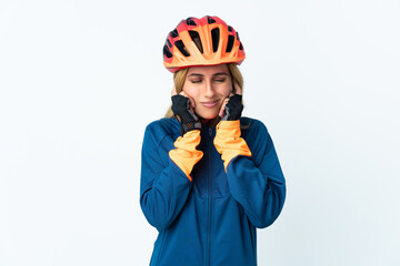 Young blonde Uruguayan cyclist woman isolated on background frustrated and covering ears