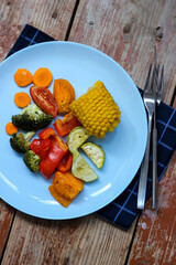 Oven roasted colorful vegetables are waiting for you in the cyan plate, let's try it! Bon appetit