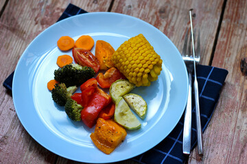 Oven roasted colorful vegetables are waiting for you in the cyan plate, let's try it! Bon appetit