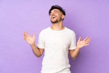 Arabian handsome man over isolated background smiling a lot