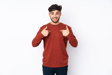 Arabian handsome man over isolated background with surprise facial expression