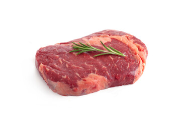 Raw rib eye steak of beef with rosemary isolated on white background