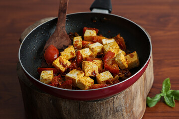 Matar Paneer curry, paneer butter masala recipe made using cottage cheese, green peas, served in a bowl.  Delhi, Rajasthan India. Indian veg curry wooden background. side dish of Roti, Chapati, naan