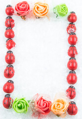 Wallpaper for computer or phone - flowers, snow and ladybugs.