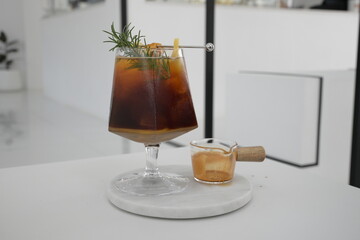 espresso shot mix with orang juice and soda rosemary lemon 