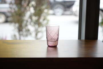 empty glass on wood table in cafe