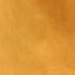 Gold or yellow paint on cement wall texture or background