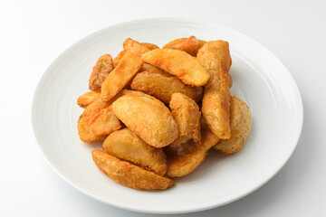 Potato wedges on a white background