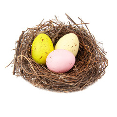 Naklejka na ściany i meble Colorful three eggs in wooden bird nest isolated on the white background
