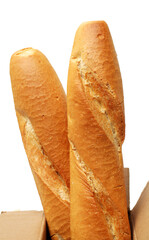 crusty mini baguettes on white surface