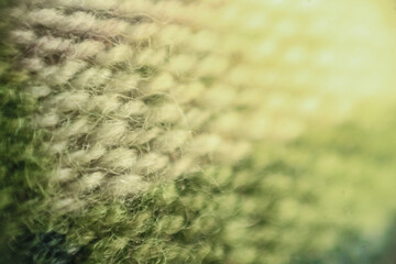 textile and texture concept - extreme close up of checkered fabric background. shallow depth of field. ideal for abstract background 