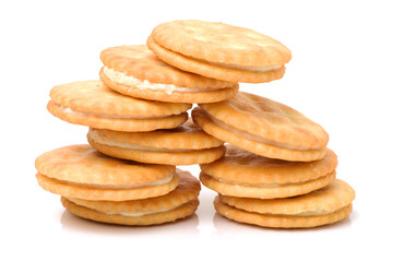 vanilla sandwich cookies on white background