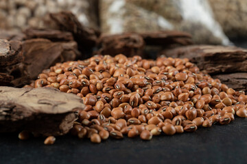 Brown kidney beans isolated on a dark background