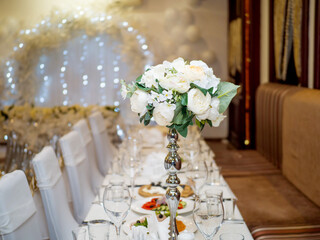 Party table, white flowers, decoration and serving