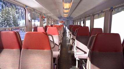 Fototapeta premium Europe, February 2021 Switzerland Alps mountain- Bernina Express, red train of Bernina Unesco world heritage - Rhaetian railway , interior of a wagon 