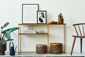 Stylish concept of living room interior with mock up poster frames, wooden console, chair, plant,...