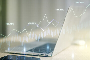 Abstract creative financial graph on modern laptop background, forex and investment concept. Multiexposure