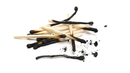 Burnt fire matches pile, burned matchsticks group isolated on white background