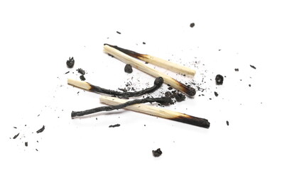 Burnt fire matches pile, burned matchsticks group isolated on white background