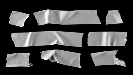 White paper tape pieces set and collection isolated on black background with clipping path, top view