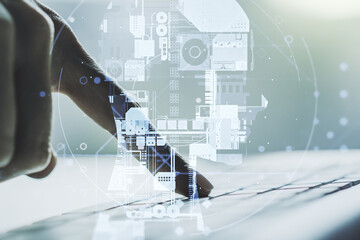 Double exposure of creative artificial Intelligence symbol with hands typing on laptop on background. Neural networks and machine learning concept