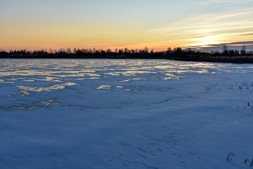 the first ice on the sun at sunset