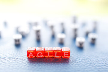 agile written on red cubes in letters