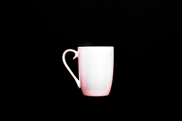 White cup of coffee, empty and blank, isolated on black background with copy space.